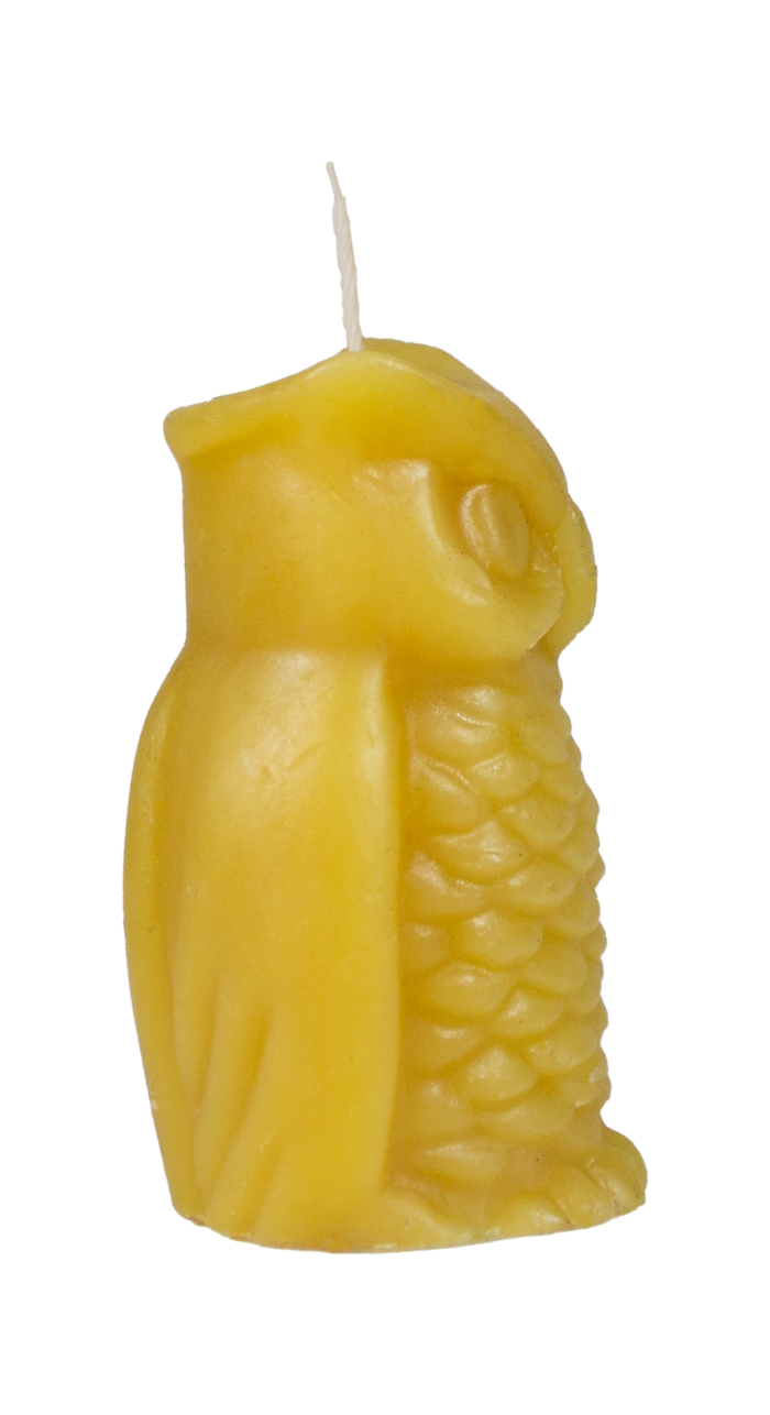 Side view of 100% natural beeswax owl candle from Bee With Nature, showing the detailed feather design