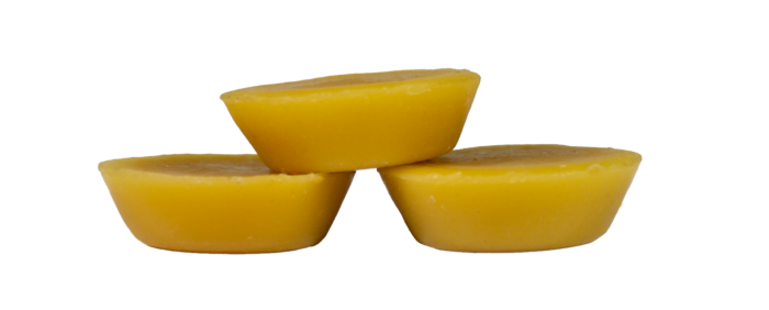 Set of 3 pure organic beeswax discs stacked on top of each other from Bee With Nature