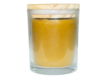 Bee With Nature 100% pure organic beeswax candle in a glass jar with the lid on