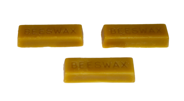 Top view of set of 3 pure organic beeswax blocks, showing the engraved 'BEESWAX' on each block, from Bee With Nature